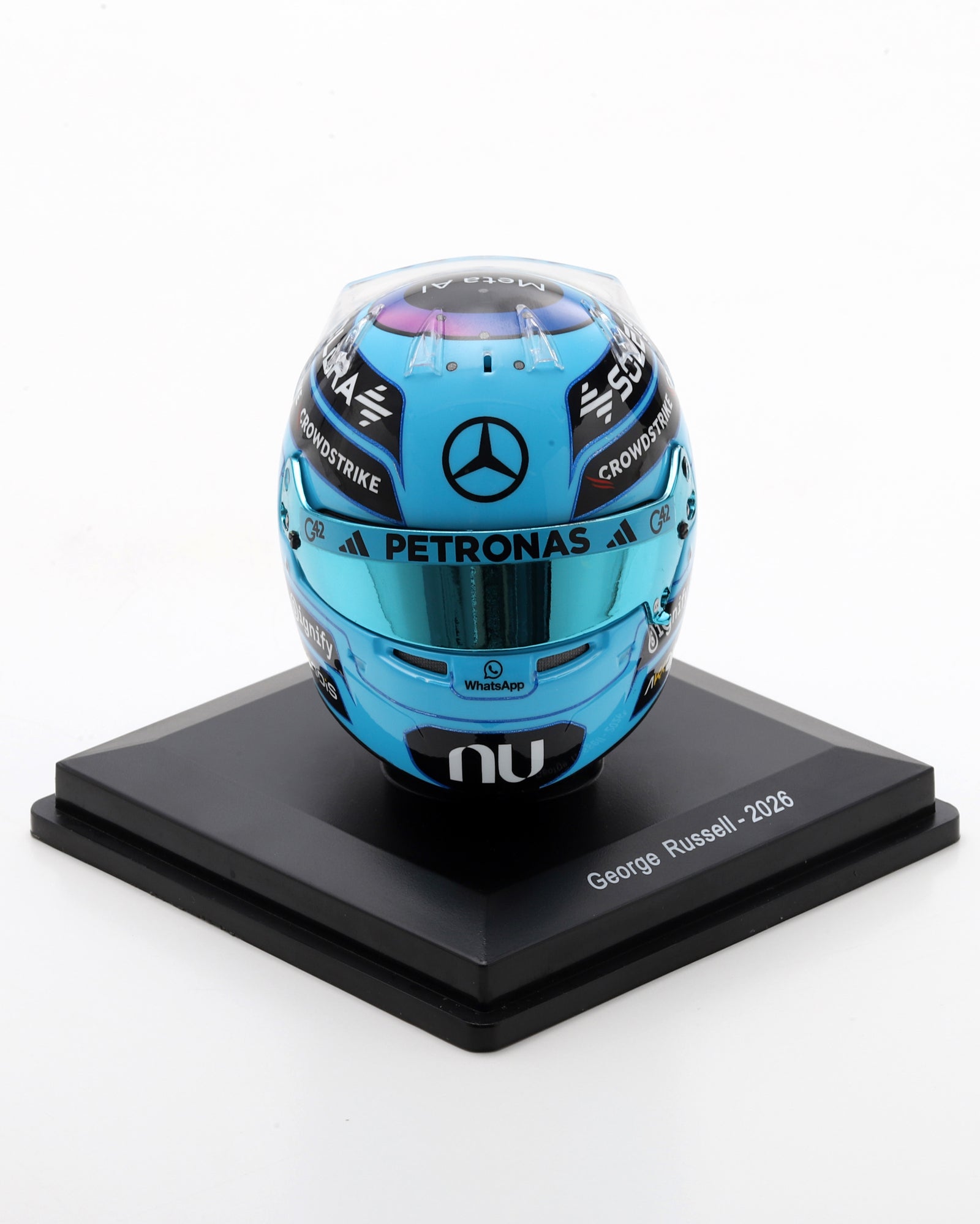 Blue 1:5 scale George Russell 2026 replica helmet with Mercedes branding and tinted visor on a black stand.