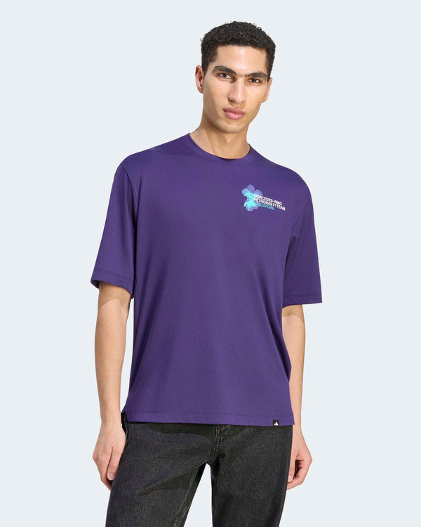 Male model wearing the purple Mercedes-AMG Petronas F1 Team Vanda Bloom T-shirt featuring a subtle chest graphic.