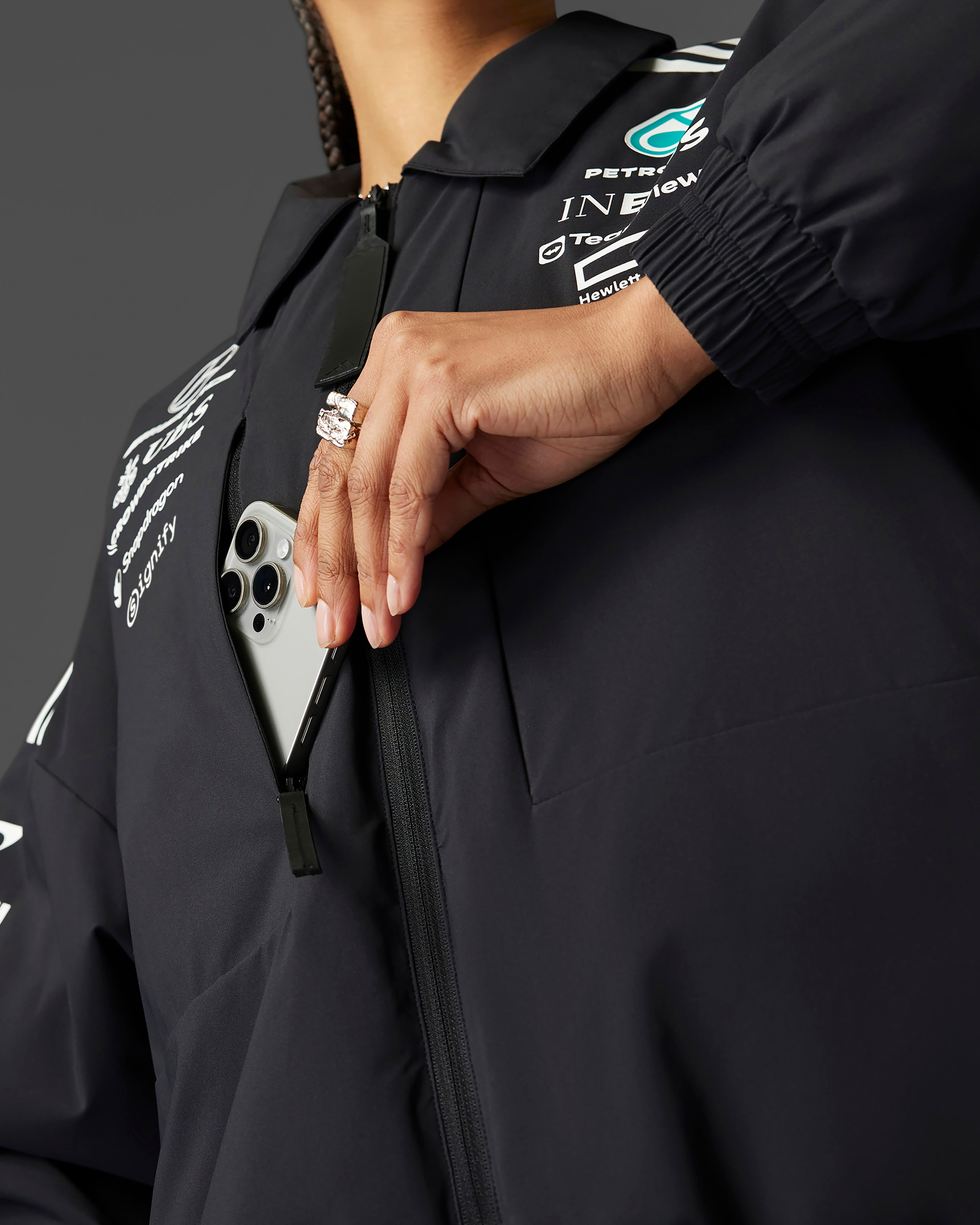 Womens 2025 Team Jacket Black | Official Mercedes-AMG PETRONAS F1
